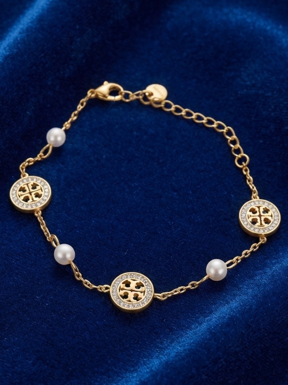 Gold-Tone Bracelet with Pearls and Logo Discs Rhinestone Accents